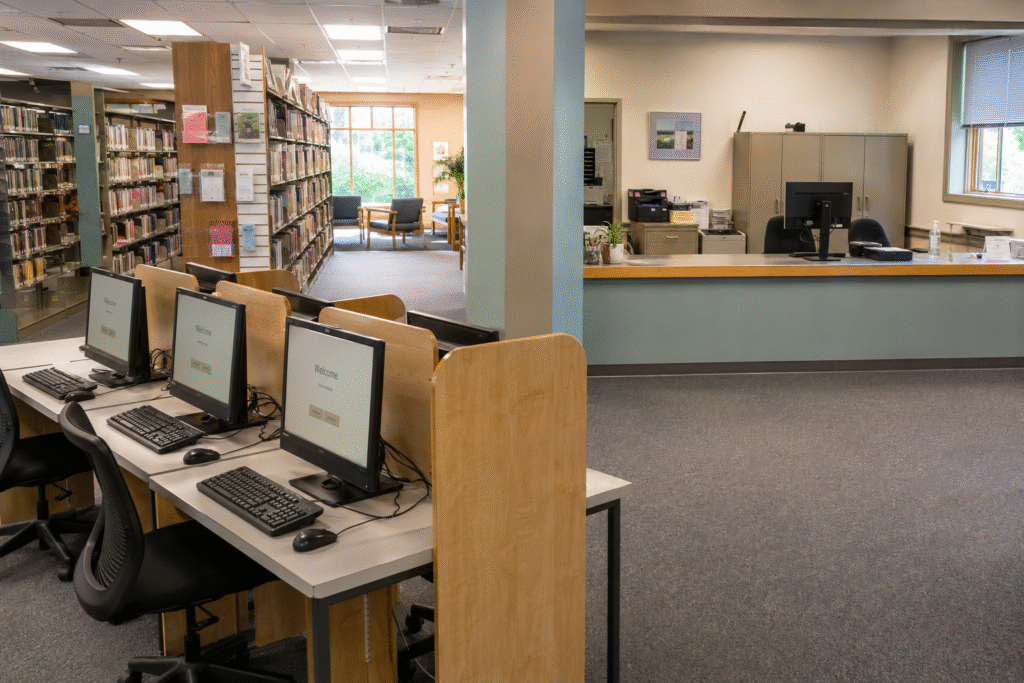 Public access computers in a library separated from staff workstations.